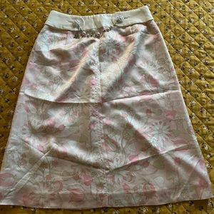 Courreges floral skirt with pearls and logo chain